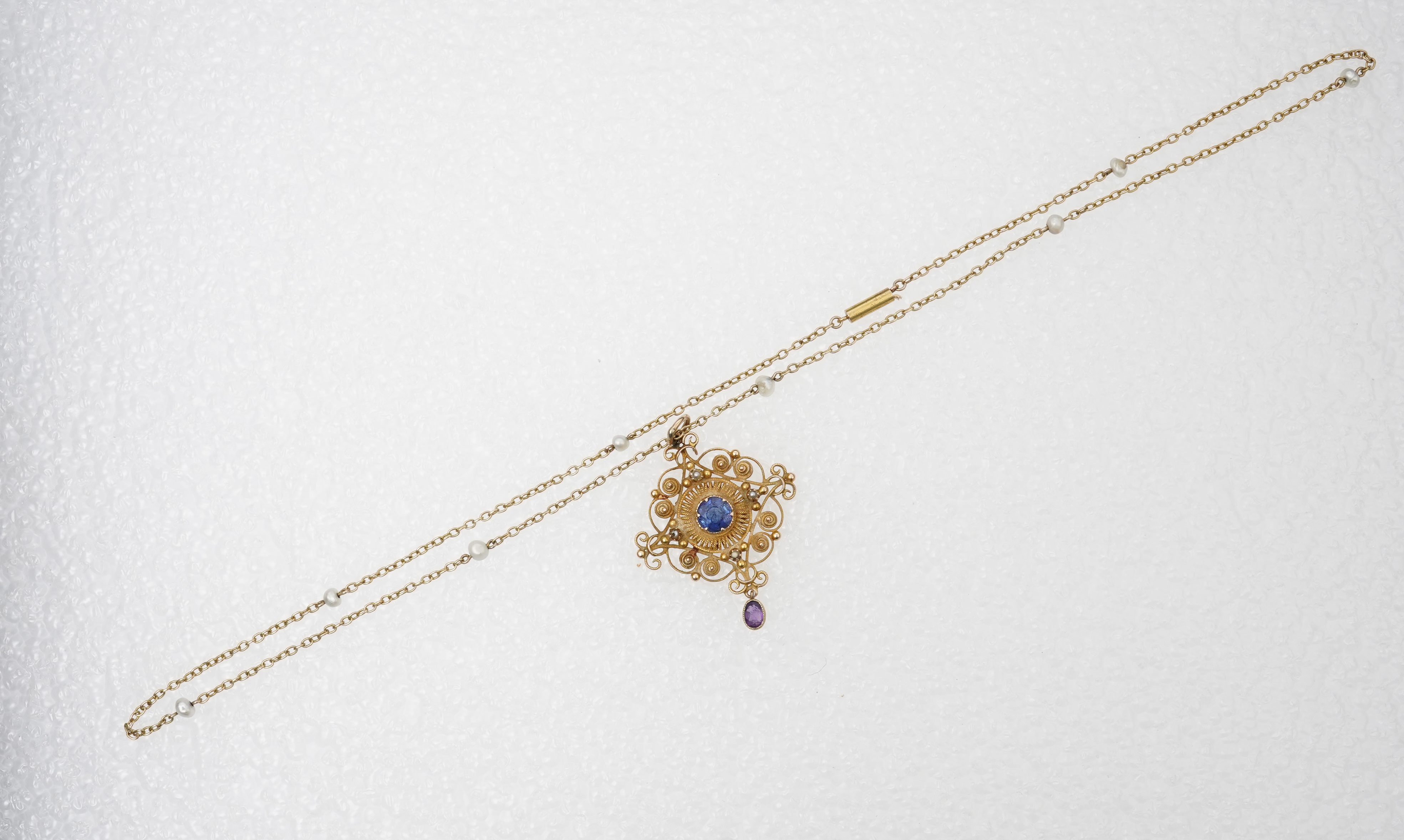 A sapphire, amethyst and pearl pendant necklace, late 19th century